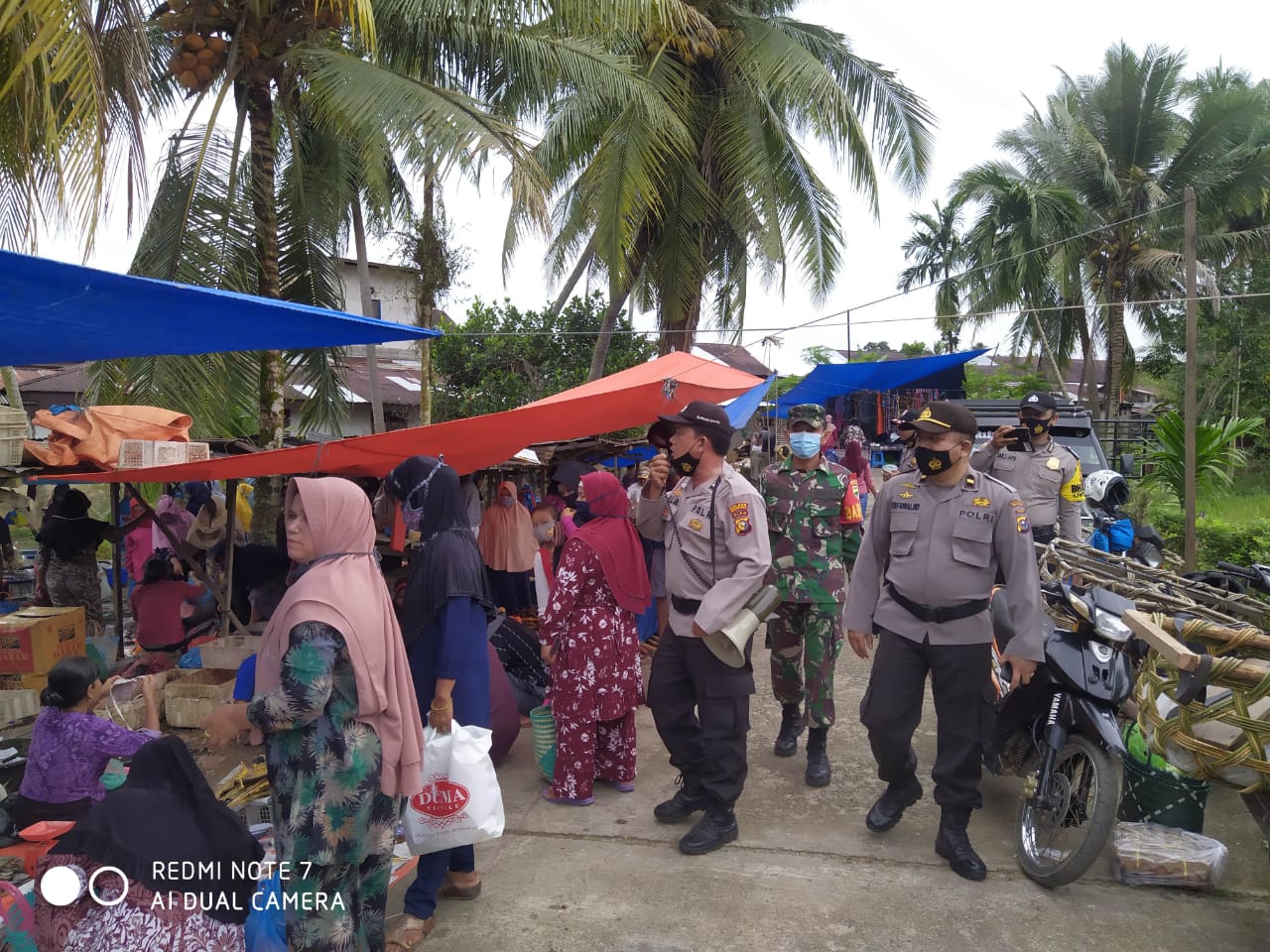Serma Ifrizal Berikan Himbauan Untuk Tertib Prokes Covid-19 Bersama Anggota Polsek Rokan IV Koto