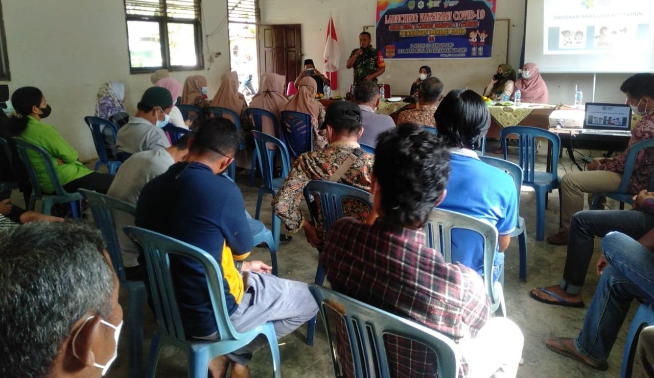 Jelang Vaksinasi, Babinsa Koramil 02 Rambah Kodim 0313/KPR Himbau Warga