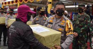 Polda Riau Bagikan 630 Ribu Masker